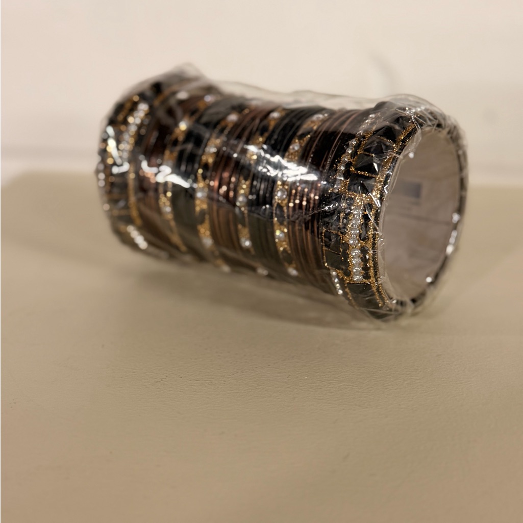Set Of Gold And Black Bangles
